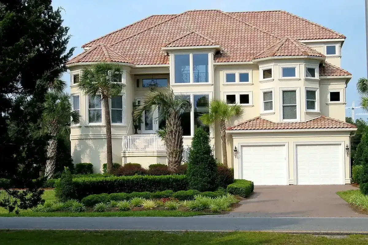 Two-story Florida single-family home with tile roof, representative of the residential Pinellas County properties