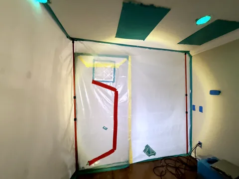 Sealed containment chamber marked for independent post-remediation verification sampling