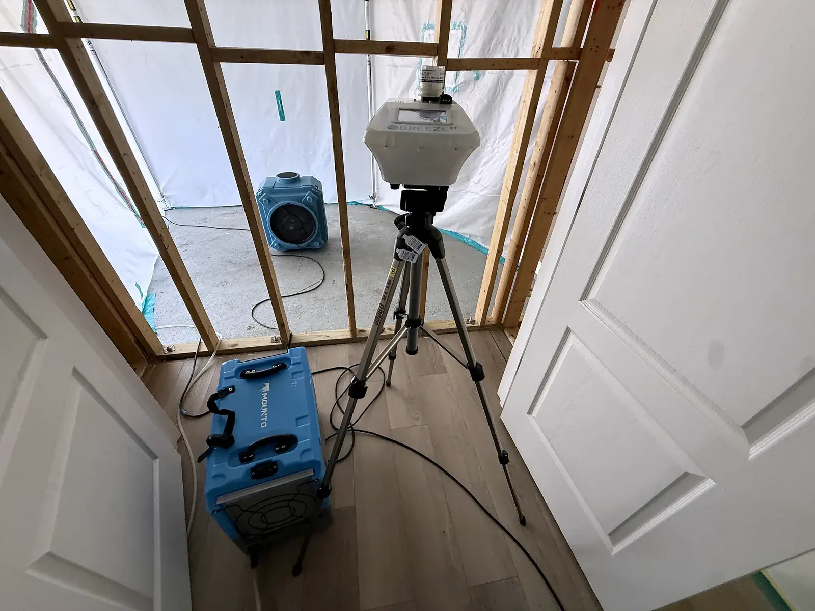 Post-remediation verification setup with negative-pressure containment, dehumidifier